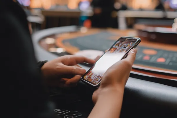 BANGBEF Jackpot Slots — Spin for massive rewards A dramatic shot of winning sevens landing on a slot reel surrounded by shining gold coins, symbolizing big wins.